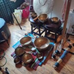 Singing bowl, rain stick and a cymbal from the band The Invisible Conductor
