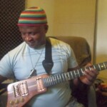Zachs playing electric guitar